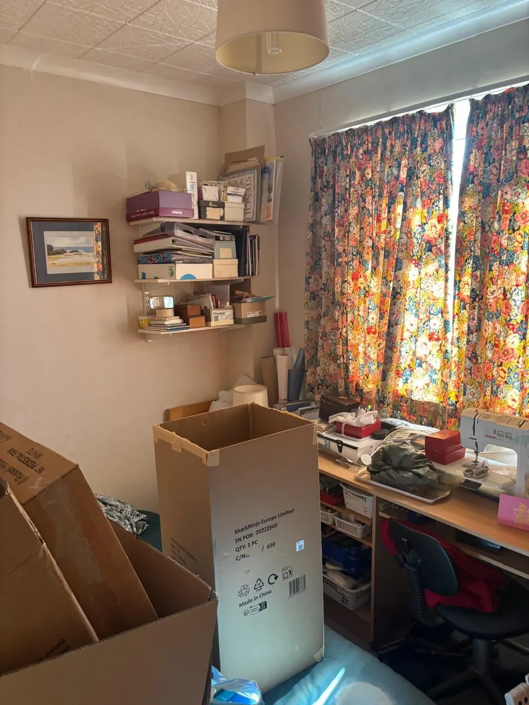 Single room clearance with boxes, shelving and a desk to be removed