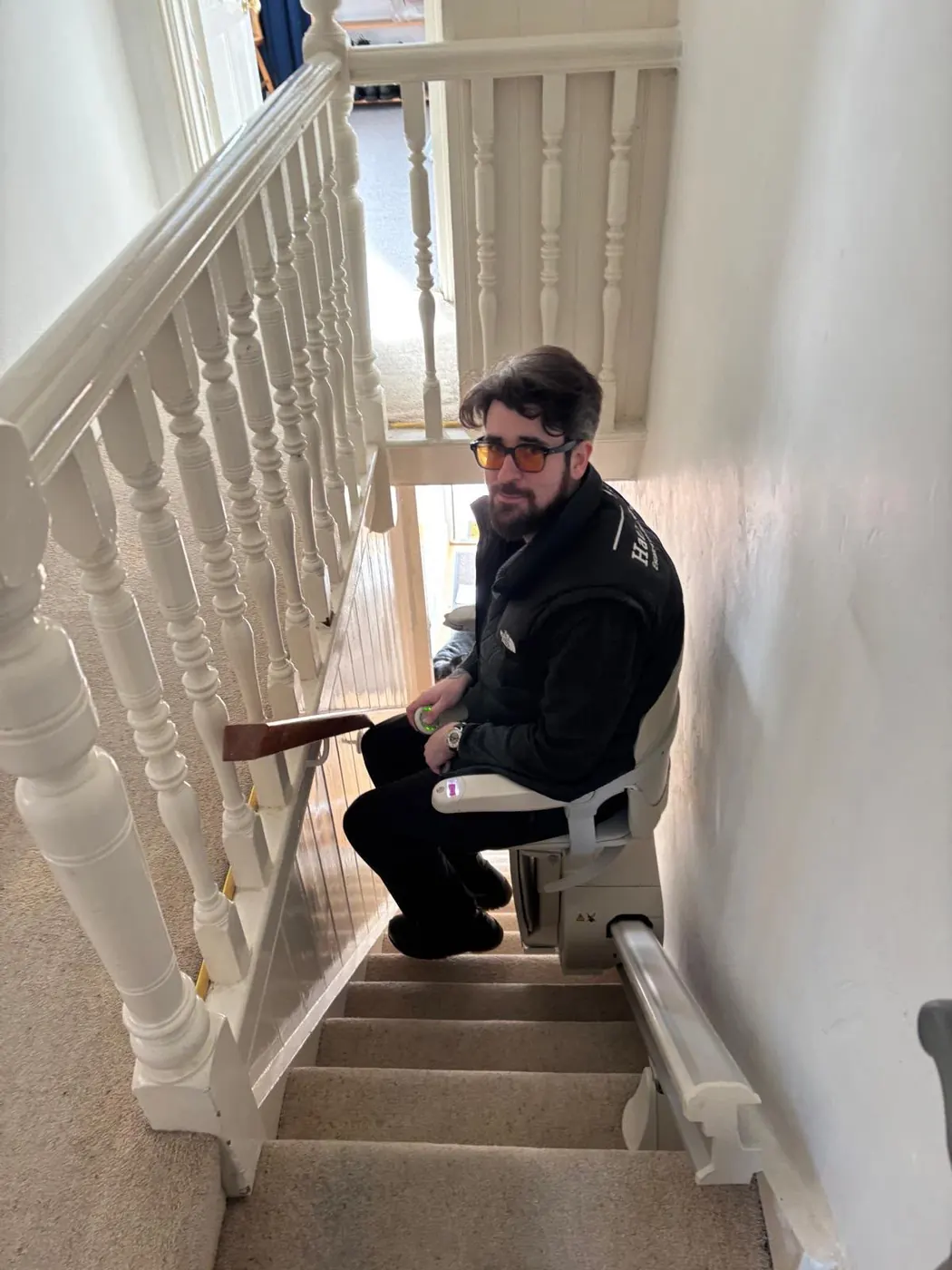 Stairlift in a hallway removed as part of a bereavement house clearance