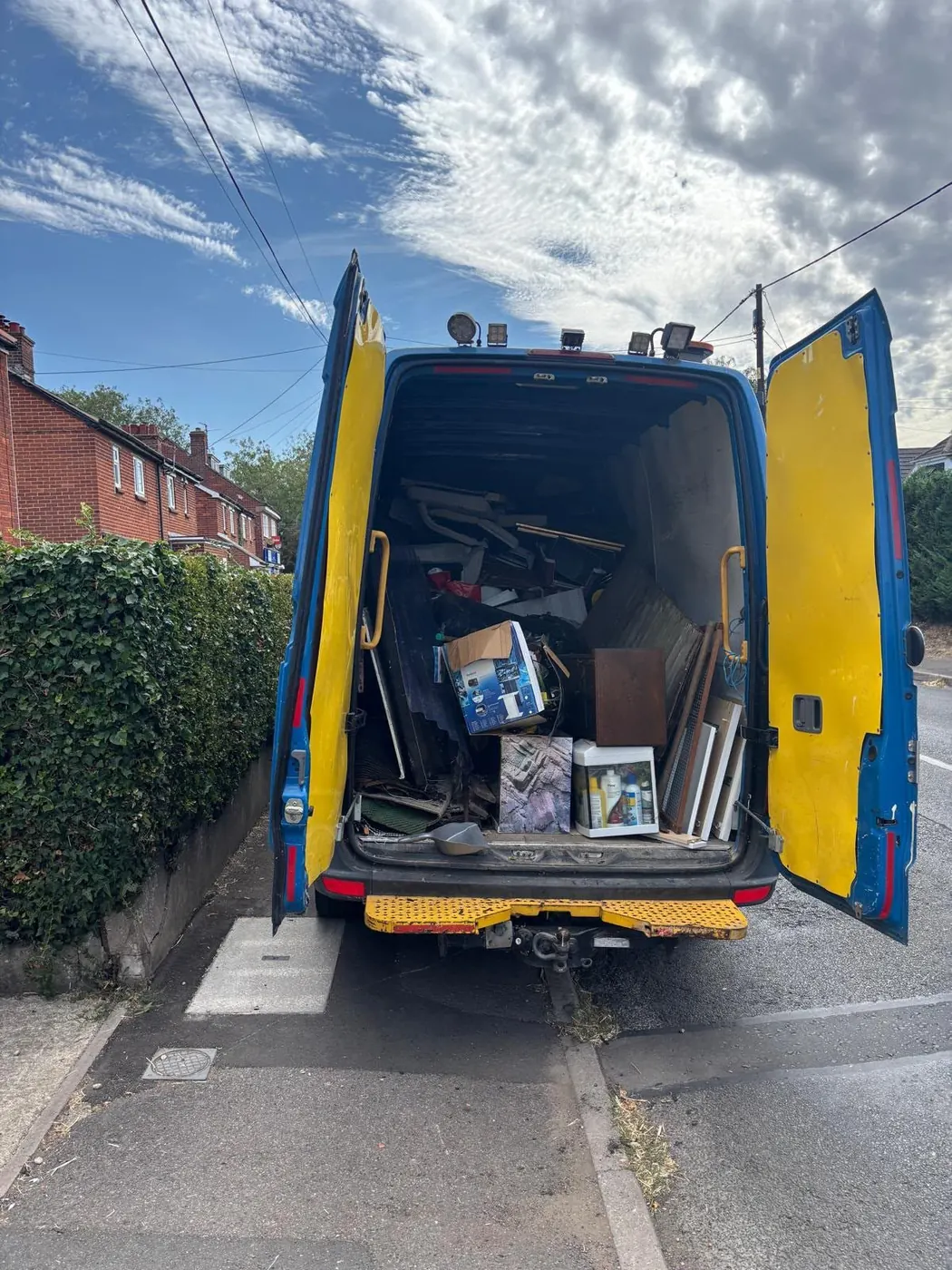 Van loaded with household rubbish during a waste removal job in Oxfordshire